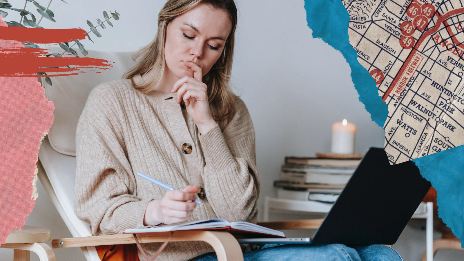 A young lady writes in a notebook while sitting with her laptop on her lap. Her face suggests she's deeply focused on a task.